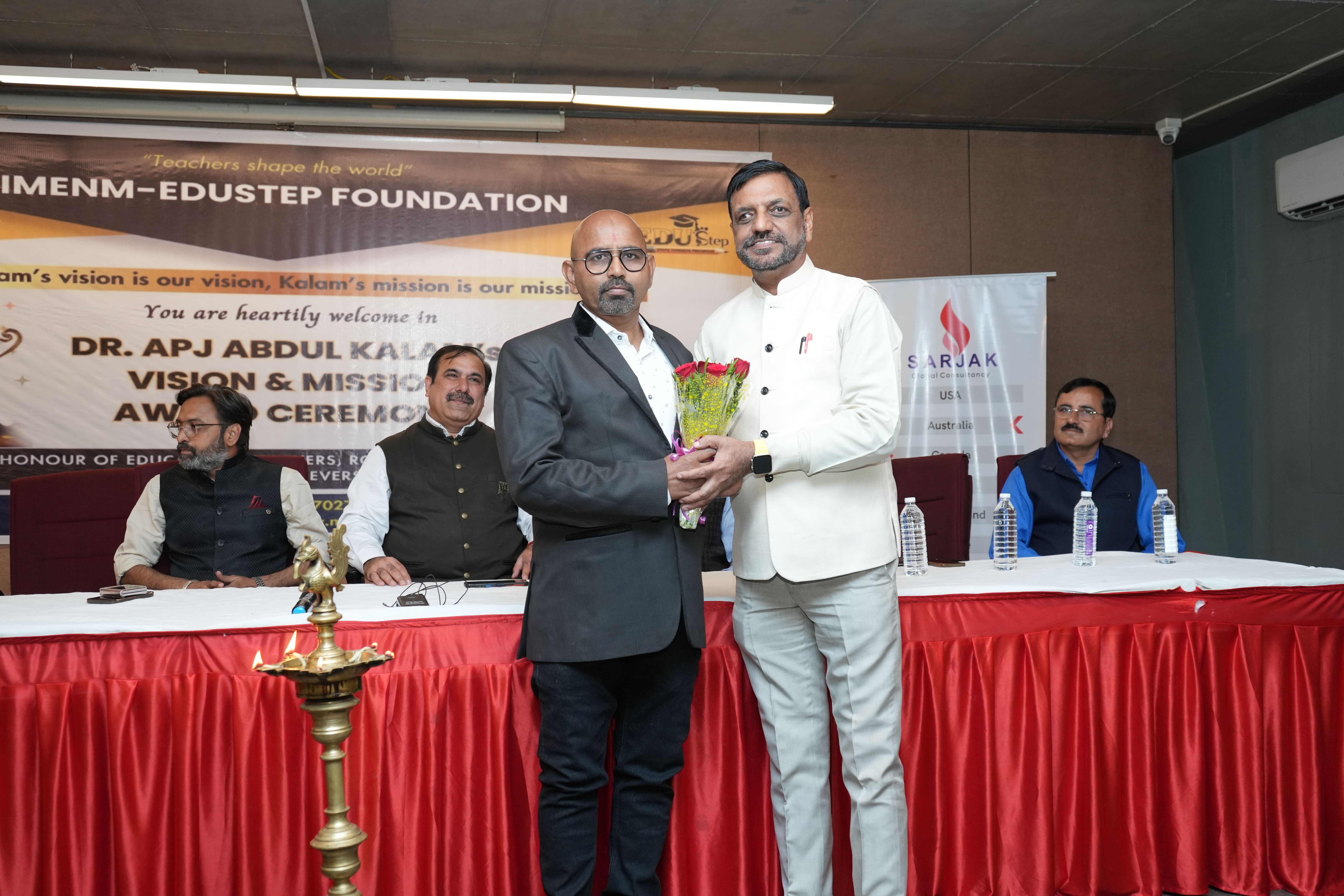 Student Holding Certificate